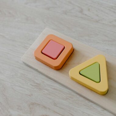 Close-up of a colorful wooden puzzle toy, ideal for sustainable learning.